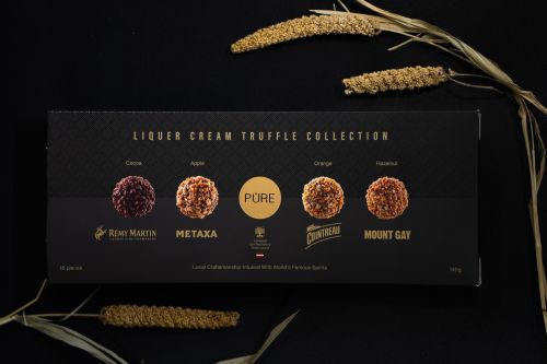 COLLECTION OF CHOCOLATE TRUFFLES WITH ALCOHOLIC CREAM FILLING